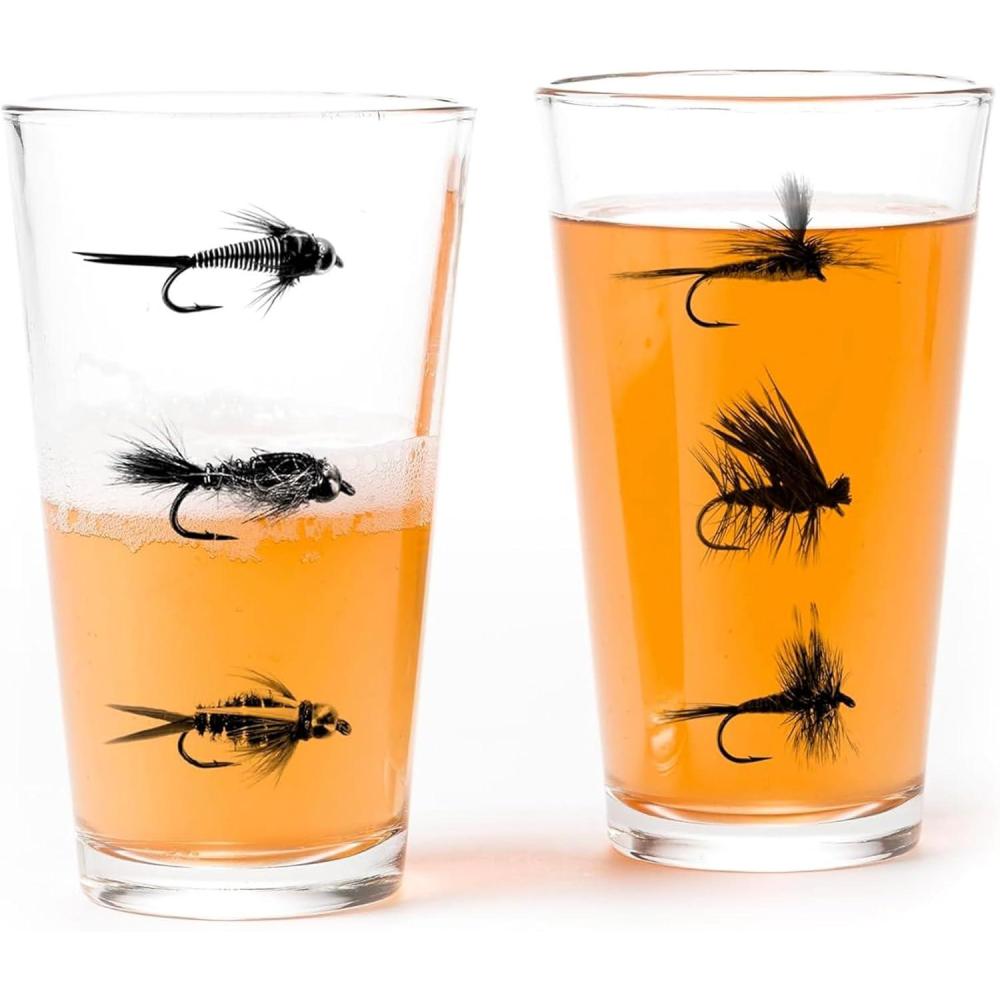 image:imagePint Glasses by Black Lantern  Beer Glasses for Craft Beer Enthusiasts  Set of Two 16oz Glasses  Bigfoot in the Forest Cocktail and Drinking Glasses  Bigfoot Lover GiftsFly Fishing Flies