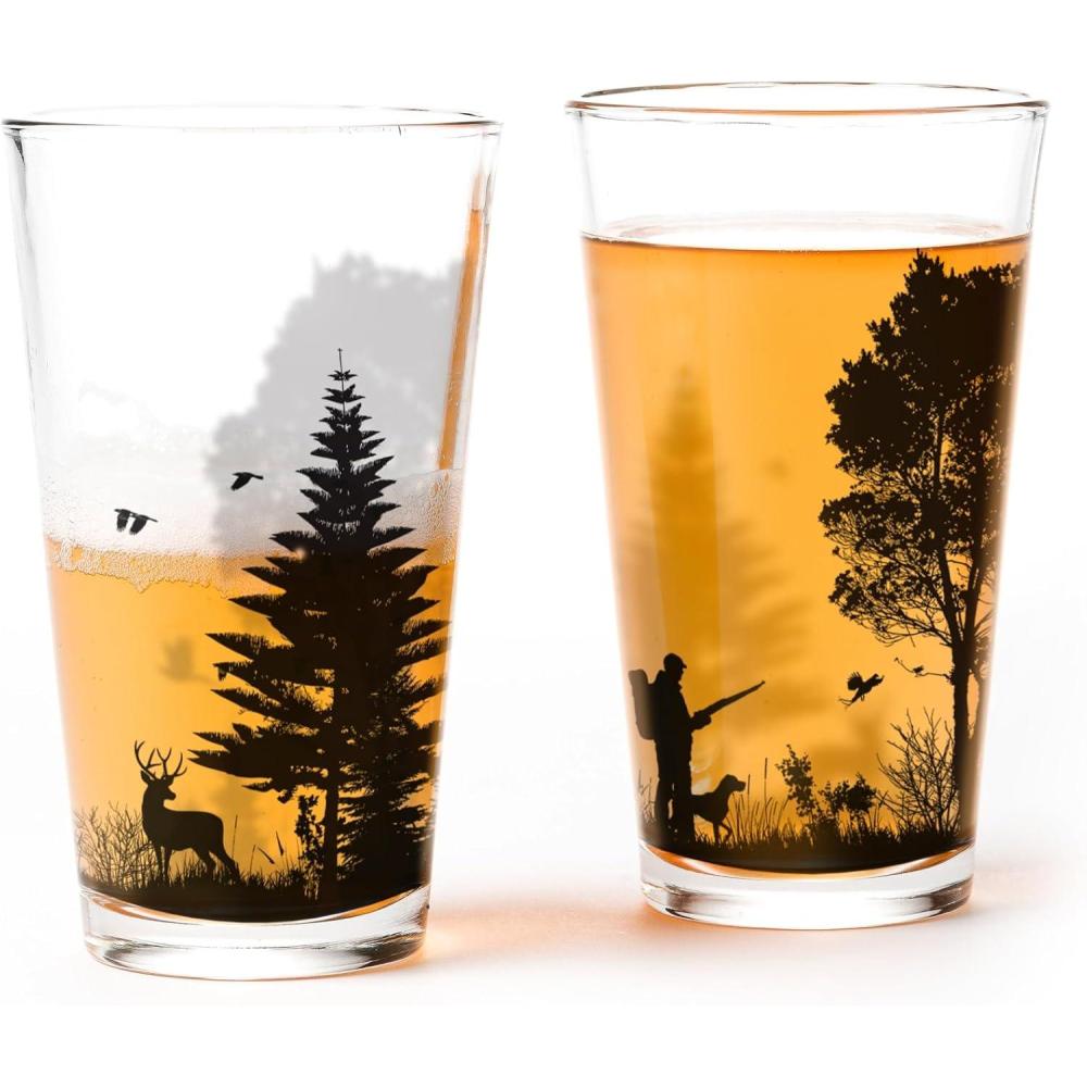 image:imagePint Glasses by Black Lantern  Beer Glasses for Craft Beer Enthusiasts  Set of Two 16oz Glasses  Bigfoot in the Forest Cocktail and Drinking Glasses  Bigfoot Lover GiftsHunting Landscape